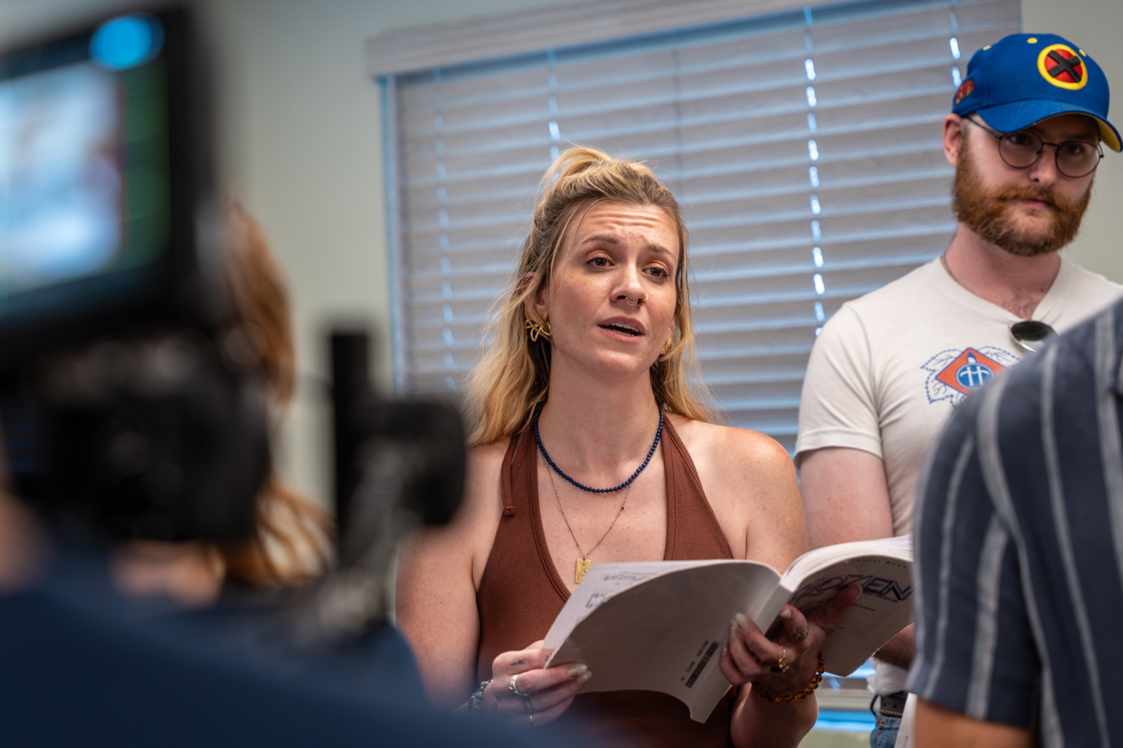 A cast member singing during music rehearsal for Frozen the Broadway Musical