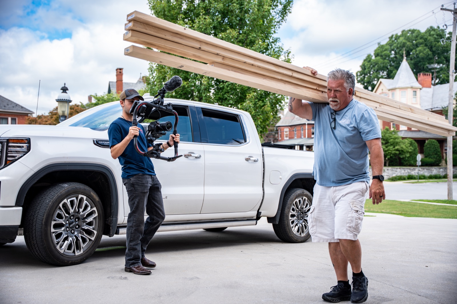 Jayden Hughes operating a stabilized cinema camera on location with JA Myers Homes